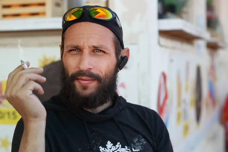 Blue Dream strain effects — consumer enjoying cannabis outdoors